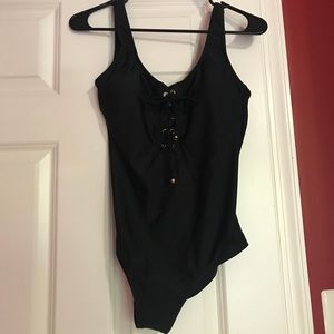 One piece black bathing suit